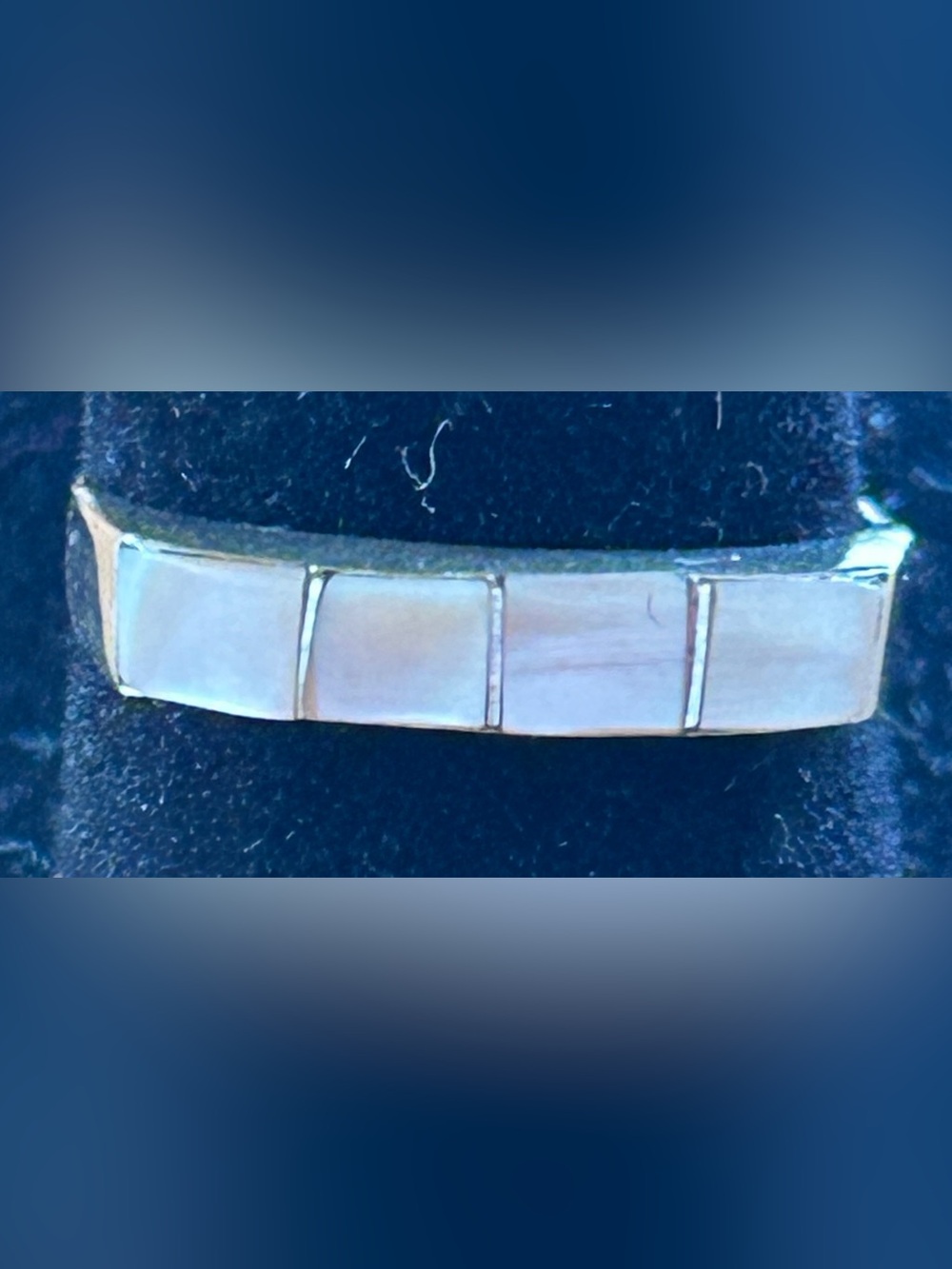 Vintage stamped and signed mother of pearl and sterling silver ring.